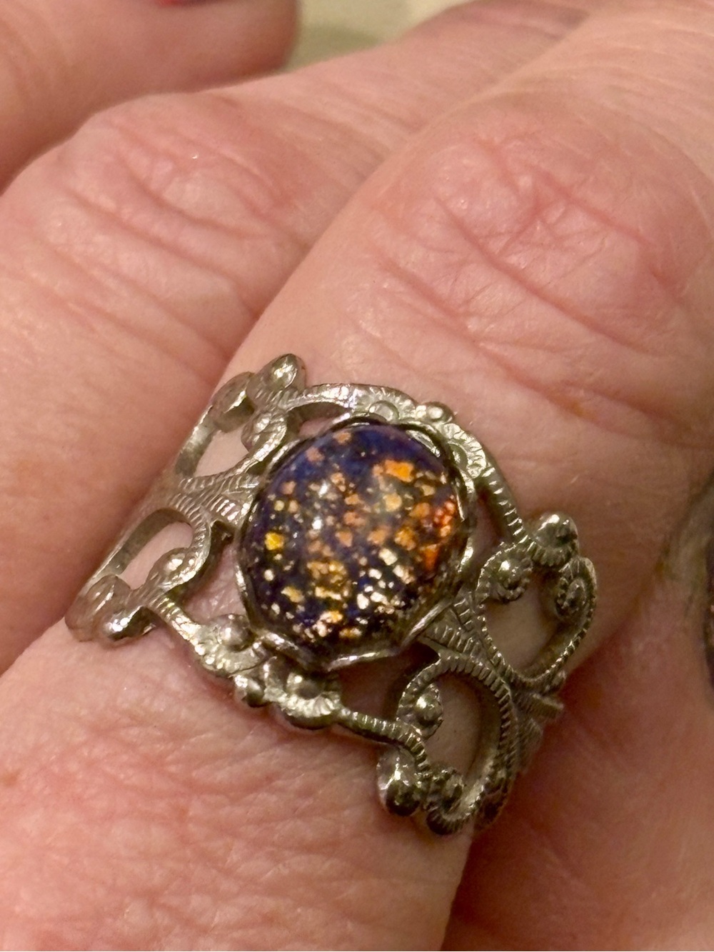 Vintage silver filigree ring with glass fire opal
